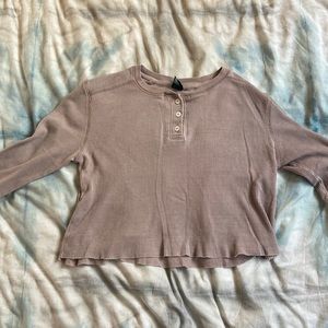 Women’s Light Pink Long Sleeve Top.